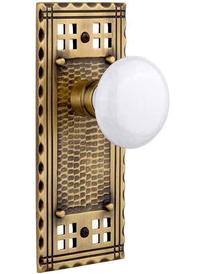 Pasadena Door Set with White Porcelain Knobs in Antique Brass.